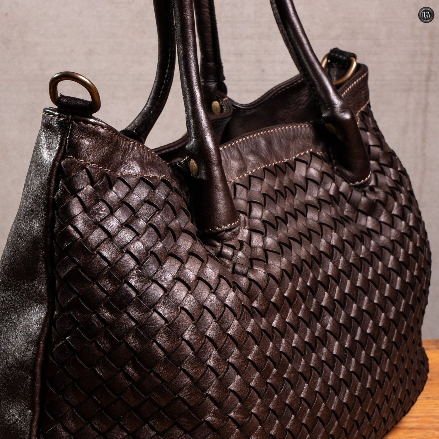 Borsa Caterina Riva in pelle intrecciata