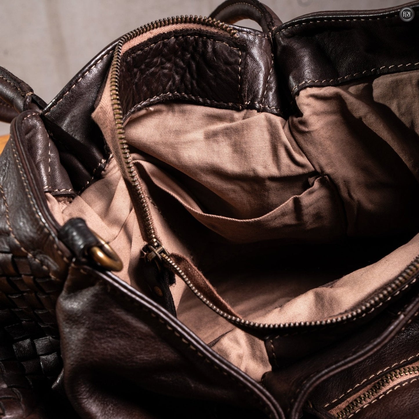 Borsa Caterina Riva in pelle intrecciata