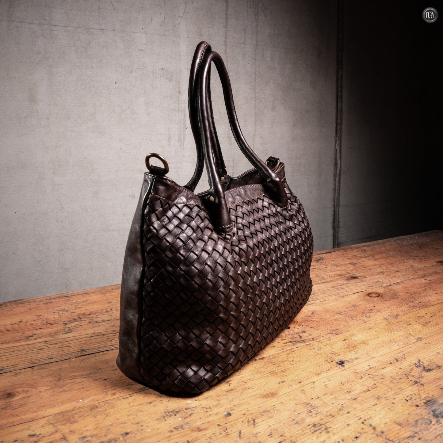 Borsa Caterina Riva in pelle intrecciata